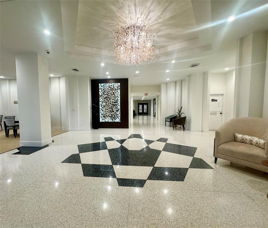 2000 South Ocean Boulevard, Unit 5P Lauderdale-by-the-Sea, FL 33062 - Photo 26 of 34 a lobby with furniture and a large mirror