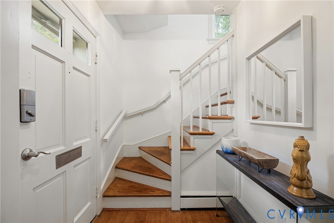 901 Bevridge Road Richmond, VA 23226 - Photo 21 of 43 a view of entryway and hall with wooden floor