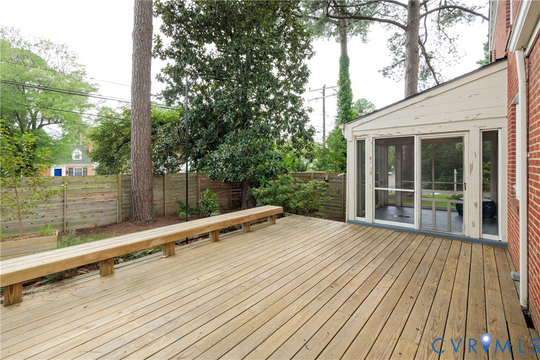 901 Bevridge Road Richmond, VA 23226 - Photo 35 of 43 a view of a backyard with wooden floor and wooden fence