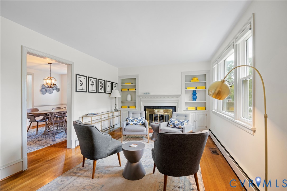901 Bevridge Road Richmond, VA 23226 - Photo 4 of 43 a view of a dining room with furniture and a potted plant