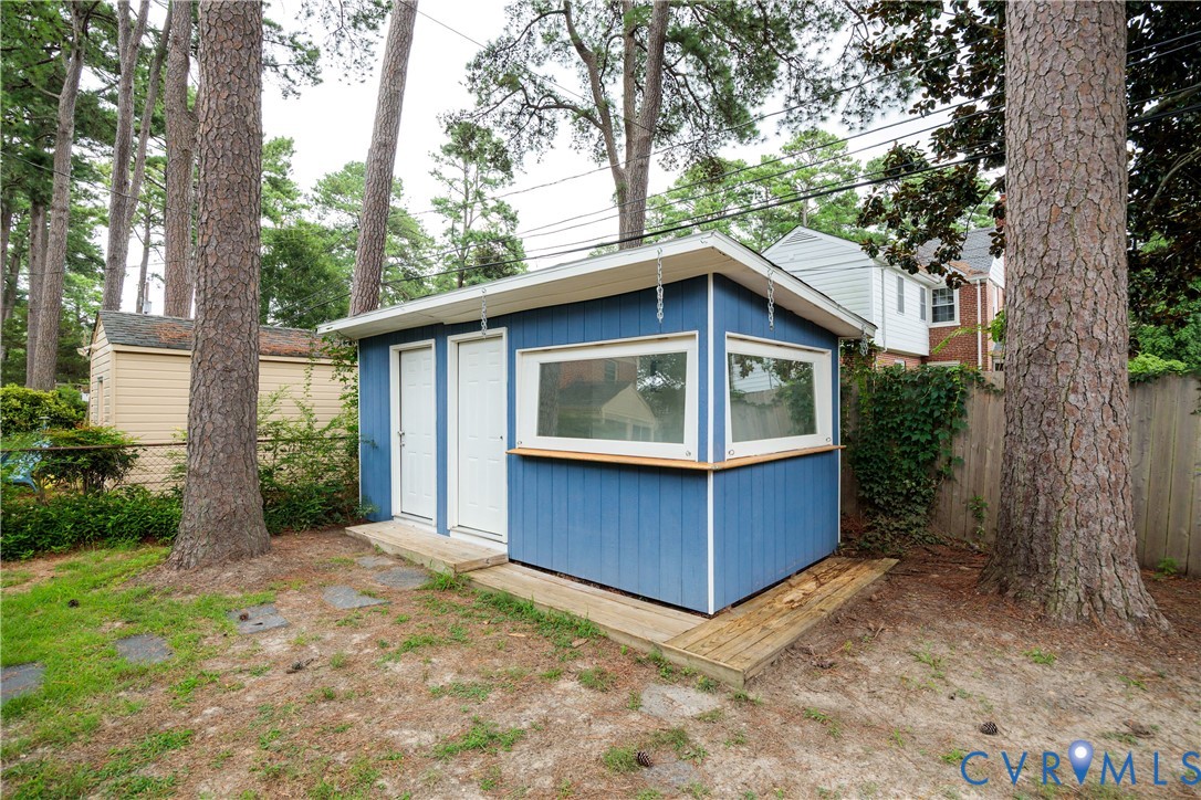 901 Bevridge Road Richmond, VA 23226 - Photo 41 of 43 a view of a house with a yard plants and large tree
