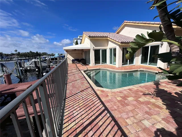 a view of a back yard of the house