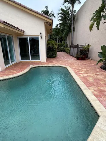 a view of a lake from a balcony