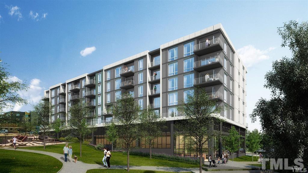 214 Hunt Street, Unit 503 Durham, NC 27701 - Photo 2 of 4 a front view of a building with street view and a fountain