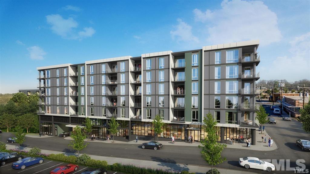 214 Hunt Street, Unit 503 Durham, NC 27701 - Photo 3 of 4 a city street lined with tall buildings