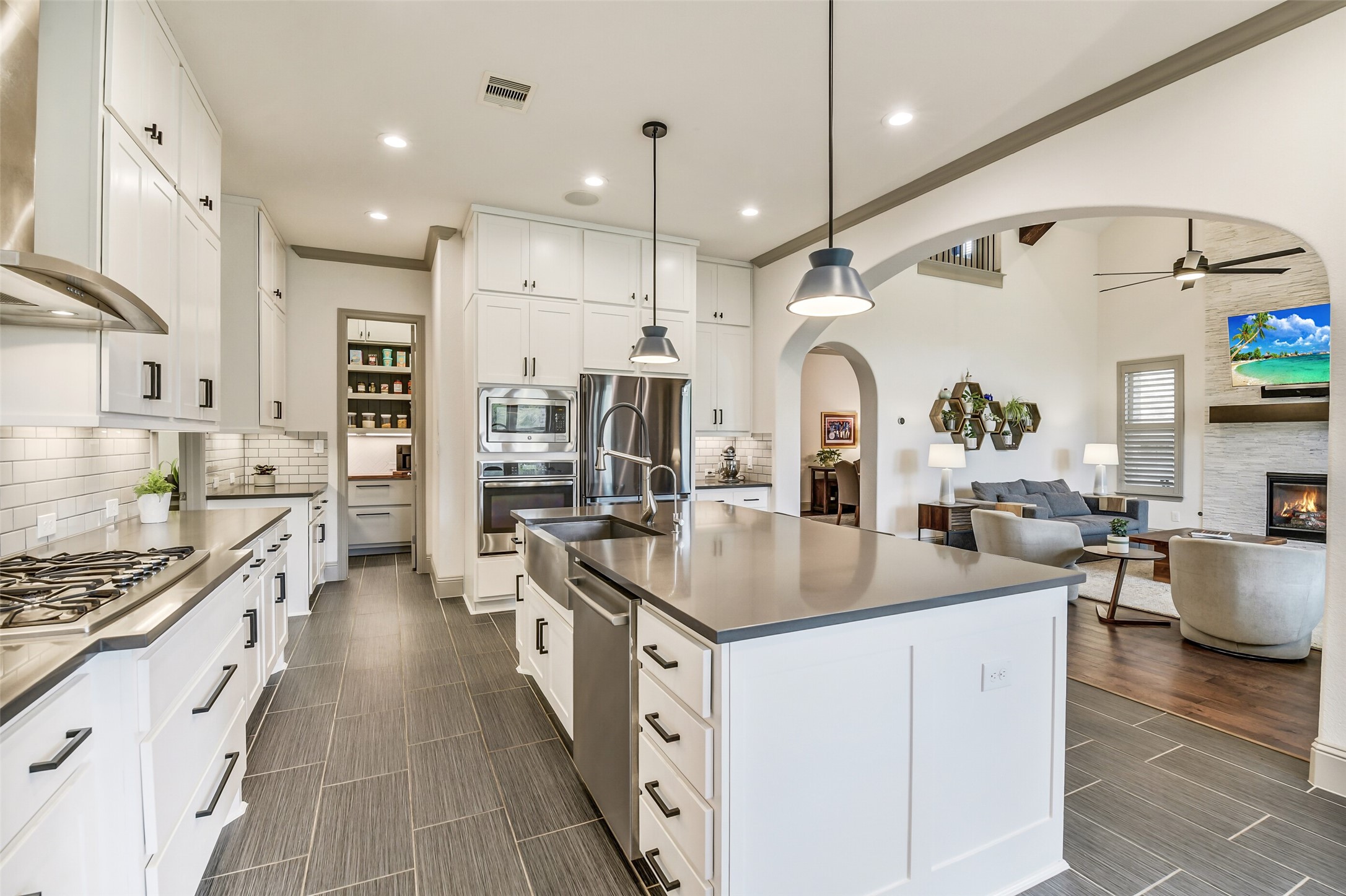 2430 Barclay Lake Lane Spring, TX 77388 - Photo 13 of 50 a kitchen with stainless steel appliances granite countertop a sink stove and refrigerator