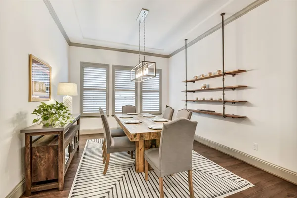 a bedroom with a bed and a table in it