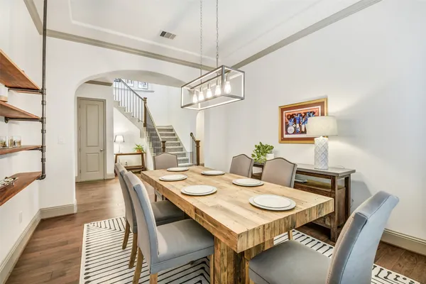 a bathroom with a bathtub a sink and a mirror