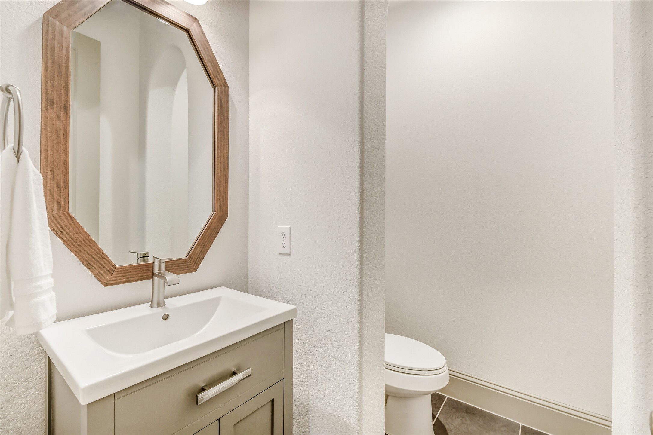 2430 Barclay Lake Lane Spring, TX 77388 - Photo 24 of 50 a bathroom with a sink a toilet and a mirror