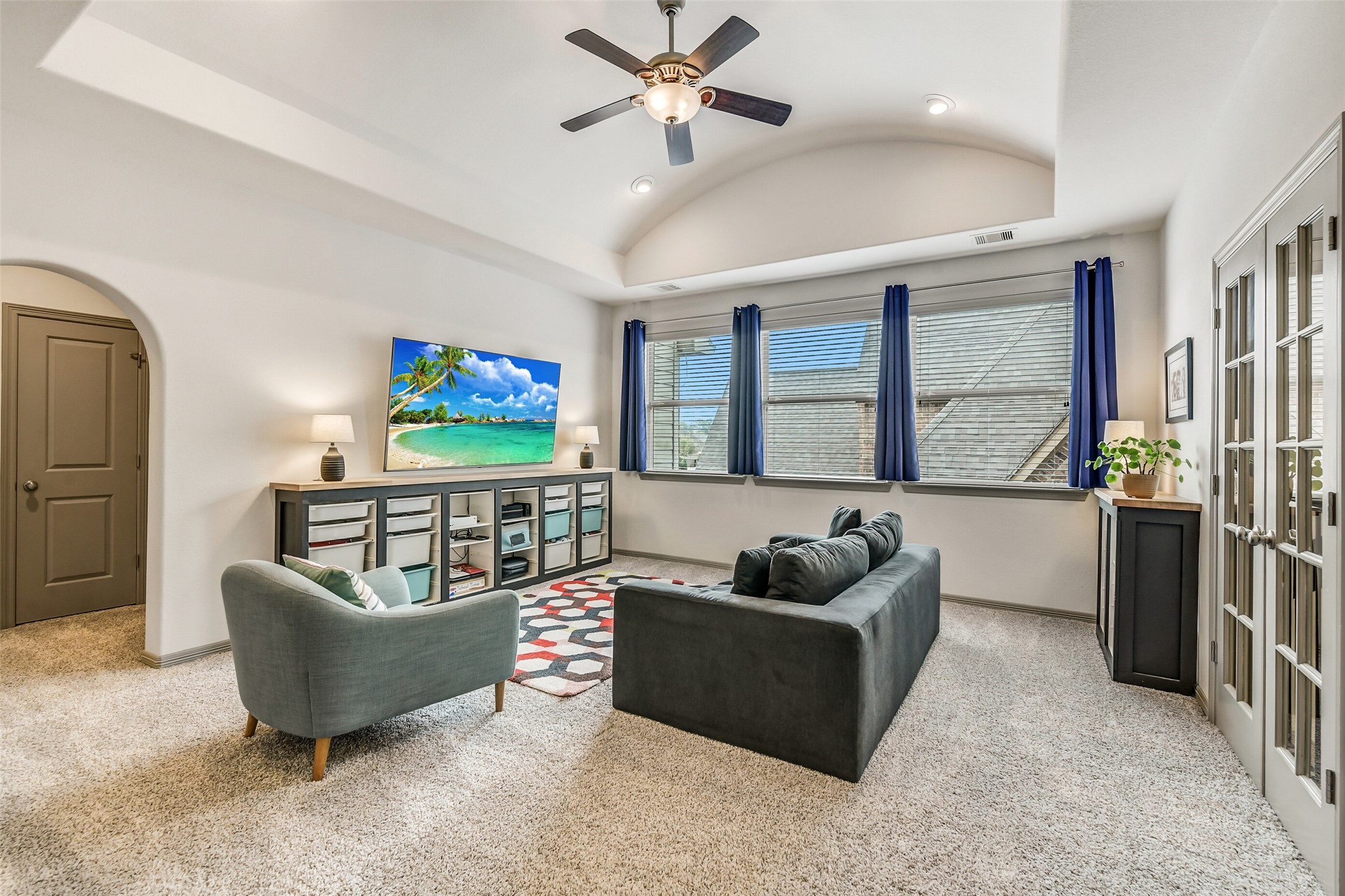 2430 Barclay Lake Lane Spring, TX 77388 - Photo 26 of 50 a living room with furniture and a flat screen tv
