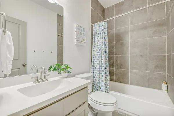a workspace with furniture and a potted plant