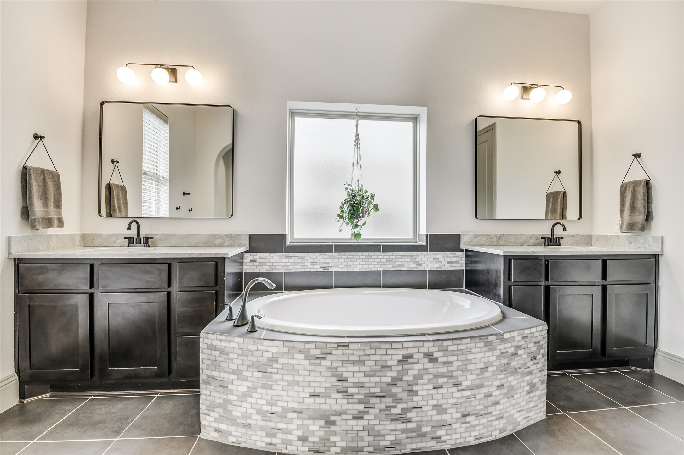 2430 Barclay Lake Lane Spring, TX 77388 - Photo 43 of 50 a bathroom with a granite countertop sink a mirror a bathtub and window