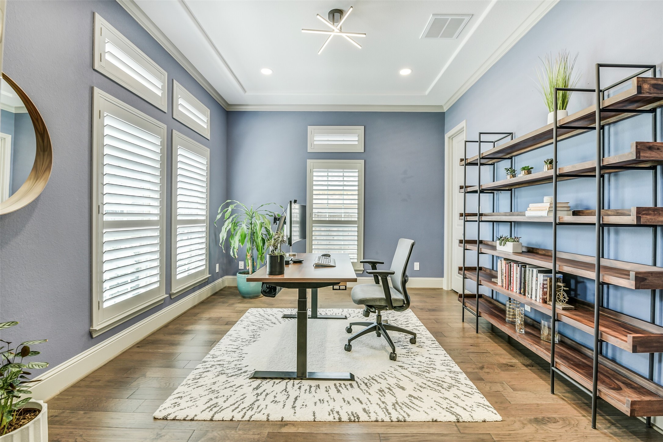 2430 Barclay Lake Lane Spring, TX 77388 - Photo 45 of 50 a living room with furniture and a book shelf