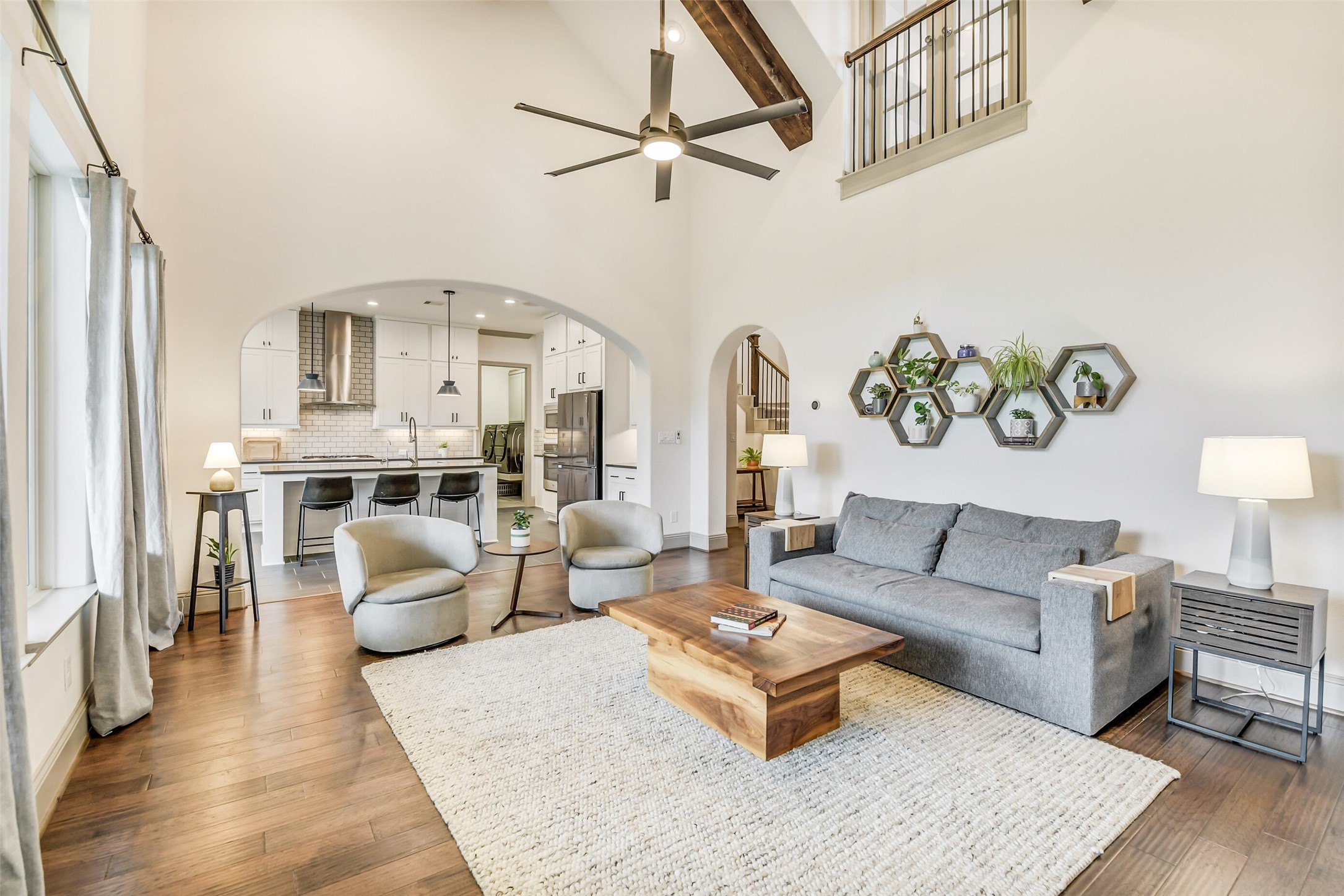 2430 Barclay Lake Lane Spring, TX 77388 - Photo 10 of 50 a living room with furniture kitchen view and a chandelier