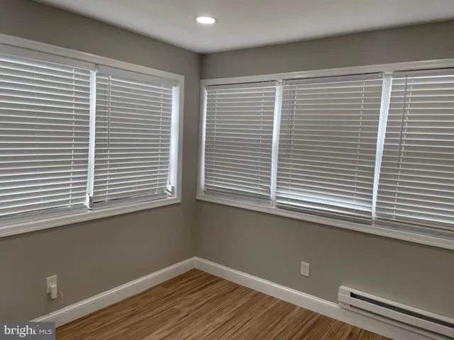 a view of a room that has a window in it