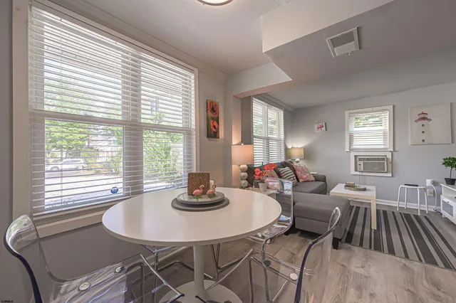 a living room with furniture and window