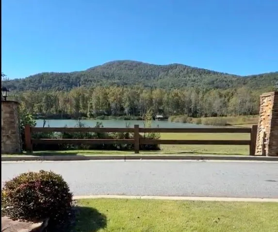 a view of balcony with wooden floor