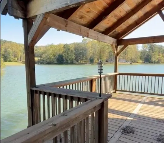a view of balcony and yard