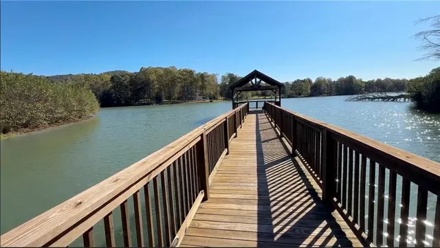 a view of balcony and yard