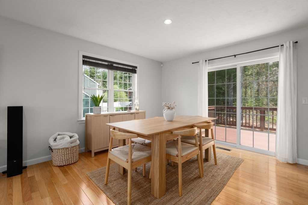 45 Cinnamon Ridge Circle Middleboro, MA 02346 - Photo 10 of 38 a view of a dining room with furniture and wooden floor