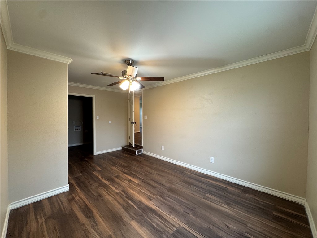 4722 Queen Drive Corpus Christi, TX 78415 - Photo 4 of 13 a view of an empty room with wooden floor