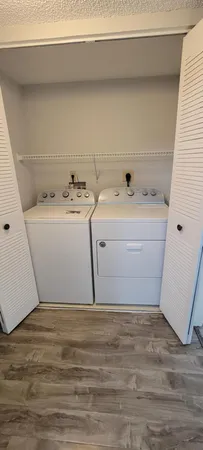 a utility room with a washer and dryer