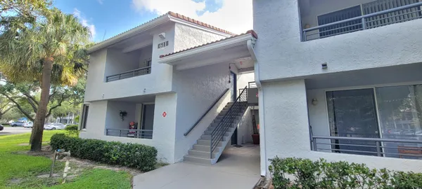 front view of a house with a small yard