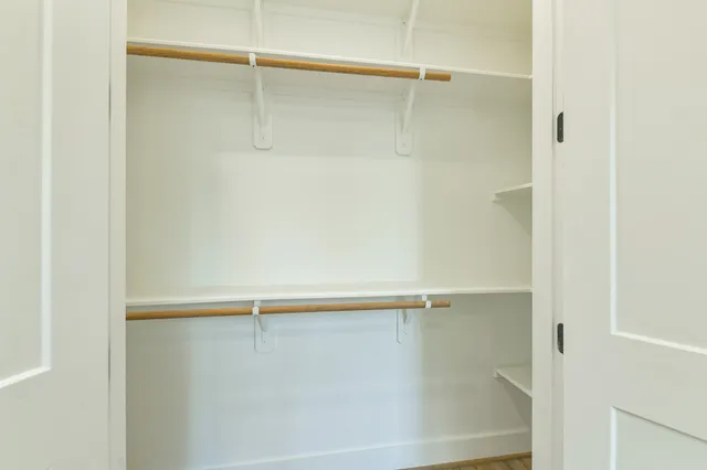 a bathroom with a bathtub and a toilet