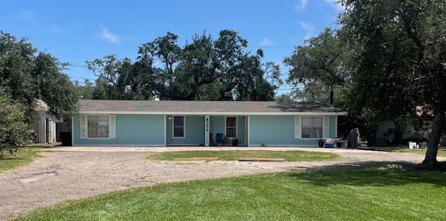 4042 Loop 1781 Rockport, TX 78382 - Photo 20 of 33 a front view of house with yard and trees