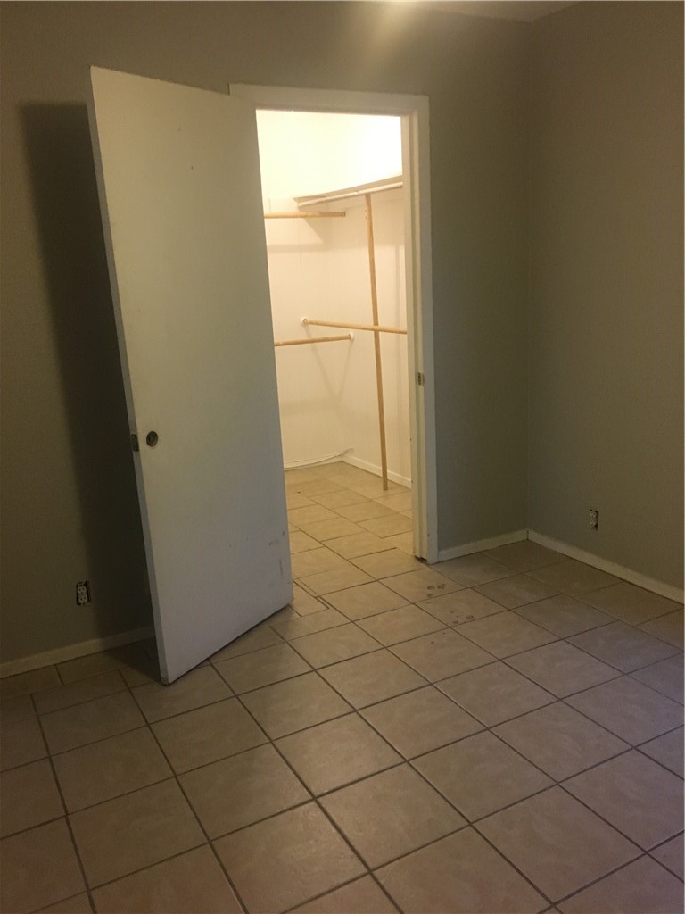 4042 Loop 1781 Rockport, TX 78382 - Photo 22 of 33 an empty room with a door