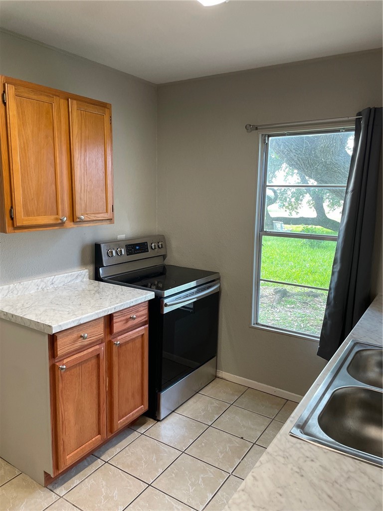 4042 Loop 1781 Rockport, TX 78382 - Photo 27 of 33 a kitchen that has a sink and a stove