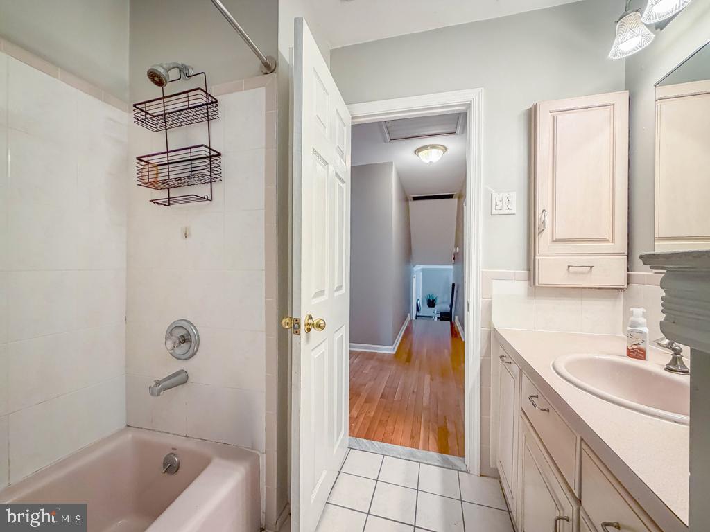 21 Rotterdam Road North Holland, PA 18966 - Photo 43 of 58 Ceramic Tile Hall Bath w/Inside Linen Closet