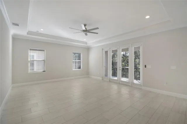 a spacious bathroom with a bathtub and a sink