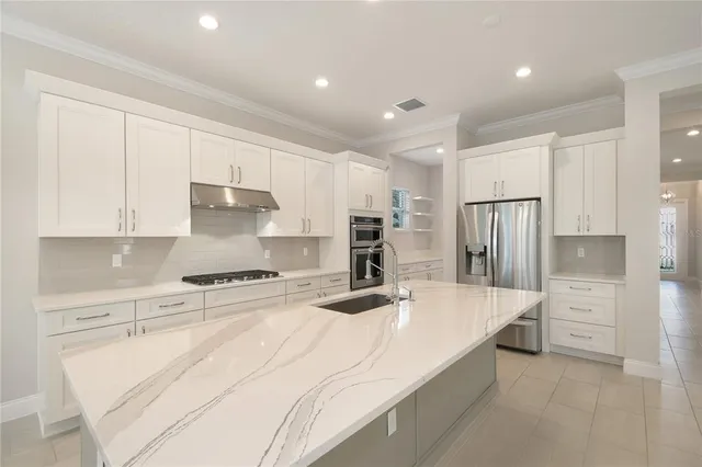 an empty room with a window and a ceiling fan