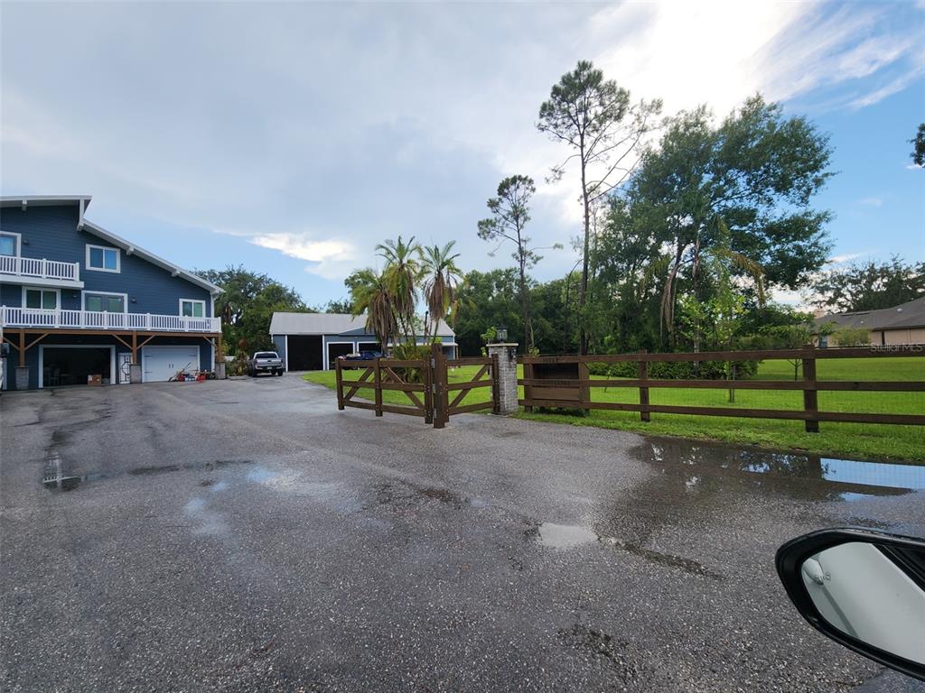 17114 Bevill Road Odessa, FL 33556 - Photo 1 of 1 a view of a park with swings