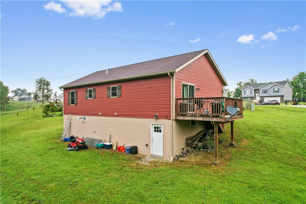418 Shagbark Road Grindstone, PA 15442 - Photo 15 of 20 a view of backyard with table and chairs