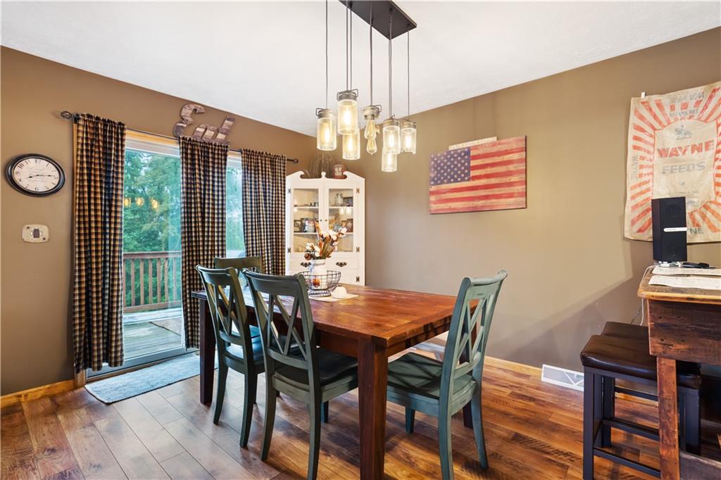 418 Shagbark Road Grindstone, PA 15442 - Photo 5 of 20 a view of a dining room with furniture window and wooden floor