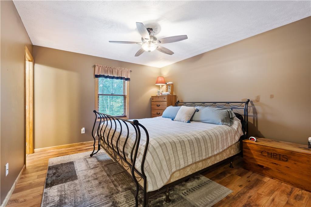 418 Shagbark Road Grindstone, PA 15442 - Photo 10 of 20 a bedroom with a bed and a window