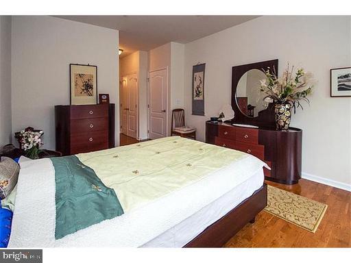 438 Carson Terrace Huntingdon Valley, PA 19006 - Photo 18 of 23 a bedroom with a bed and a dresser