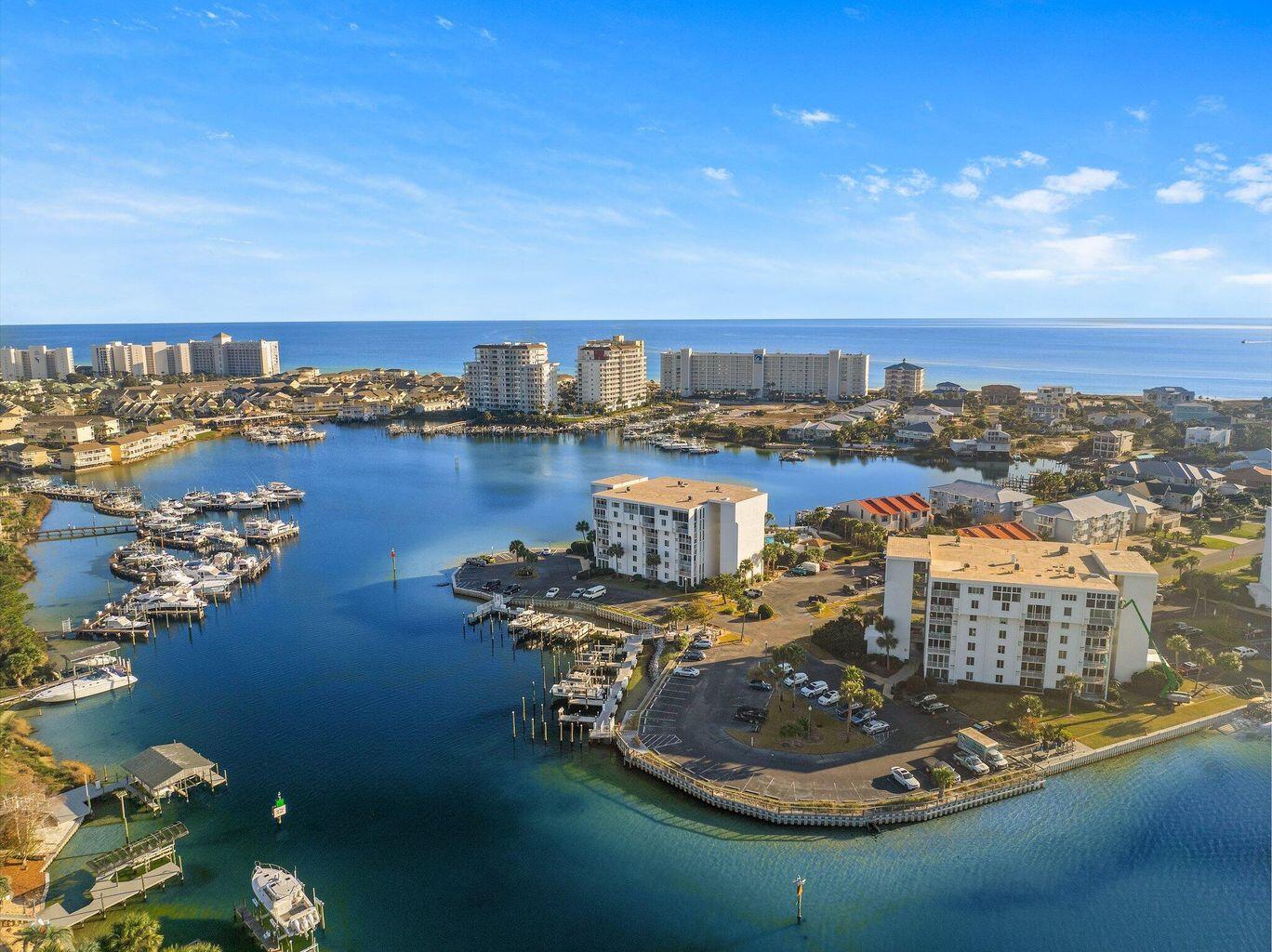 30 Moreno Point Road, Unit 404A Destin, FL 32541 - Photo 1 of 52 a view of a ocean with city