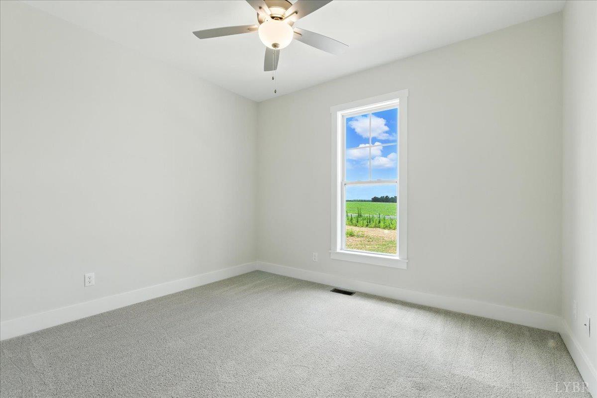 2140 Bent Creek Road Concord, VA 24538 - Photo 29 of 35 an empty room with a window and a fan