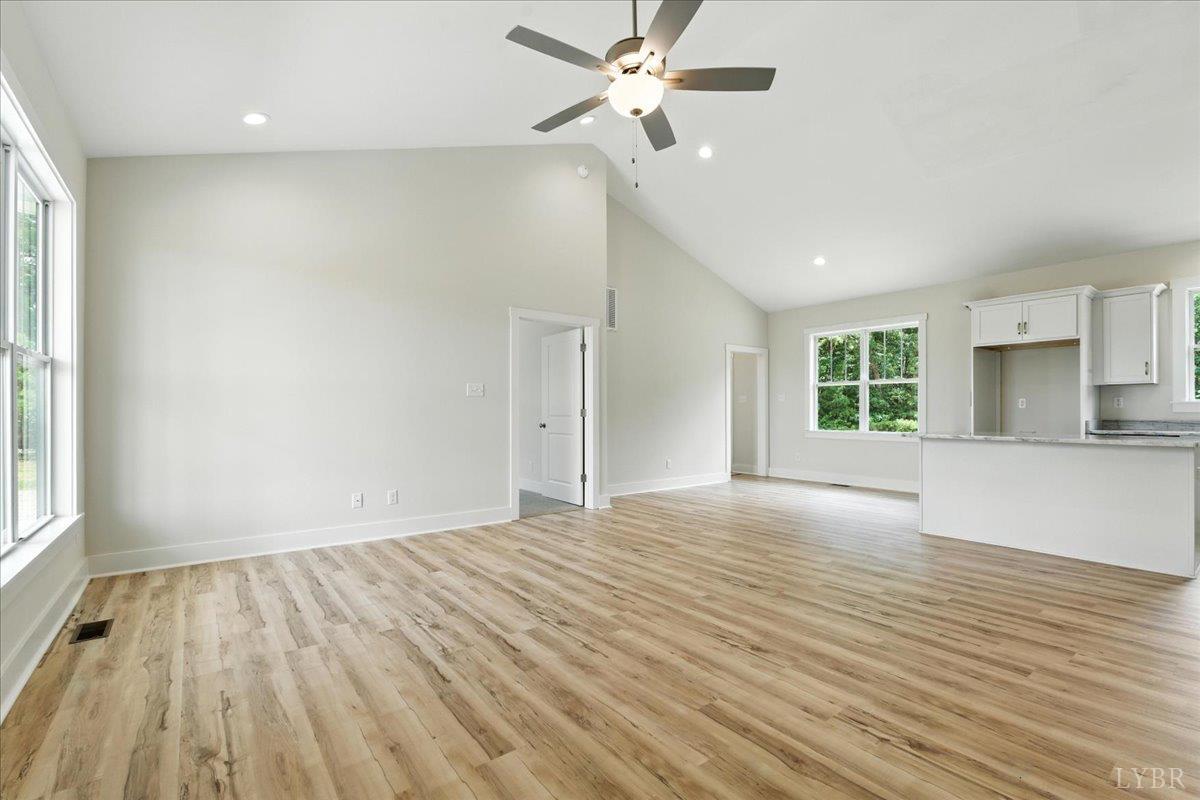 2140 Bent Creek Road Concord, VA 24538 - Photo 7 of 35 wooden floor in an empty room with a window