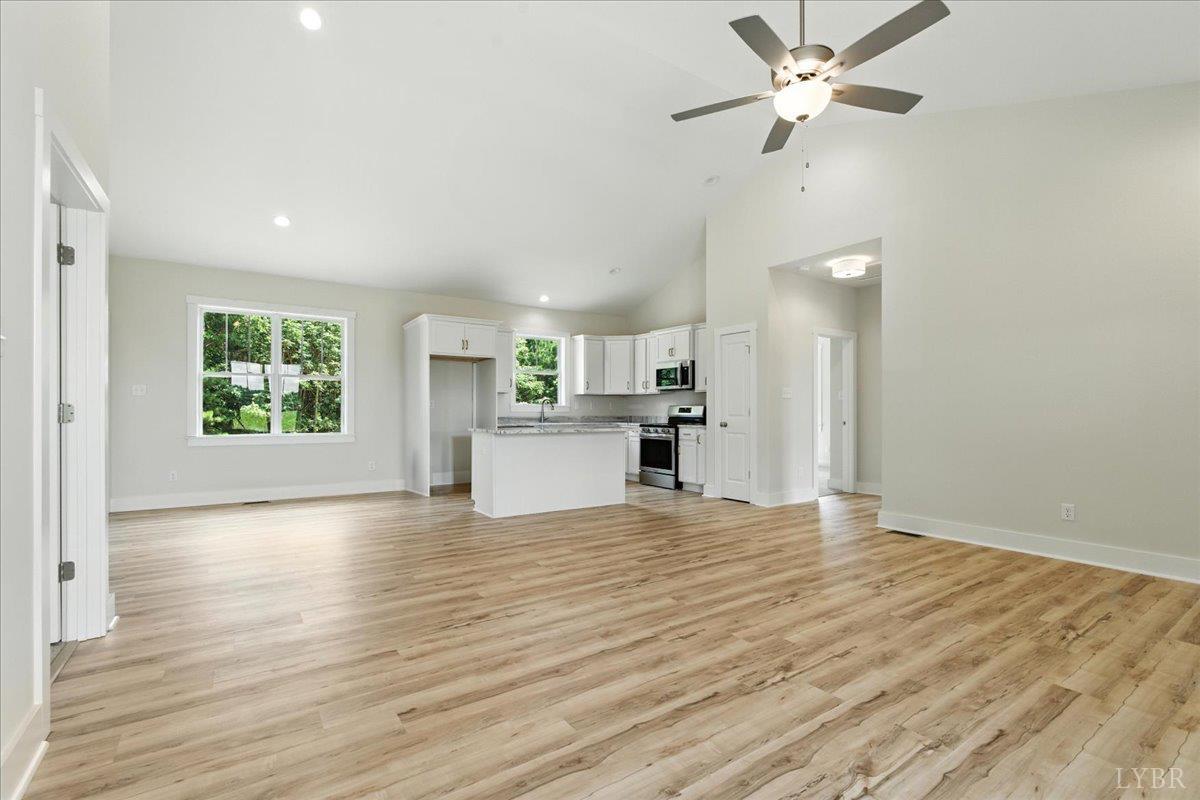 2140 Bent Creek Road Concord, VA 24538 - Photo 8 of 35 a view of empty room with wooden floor and window