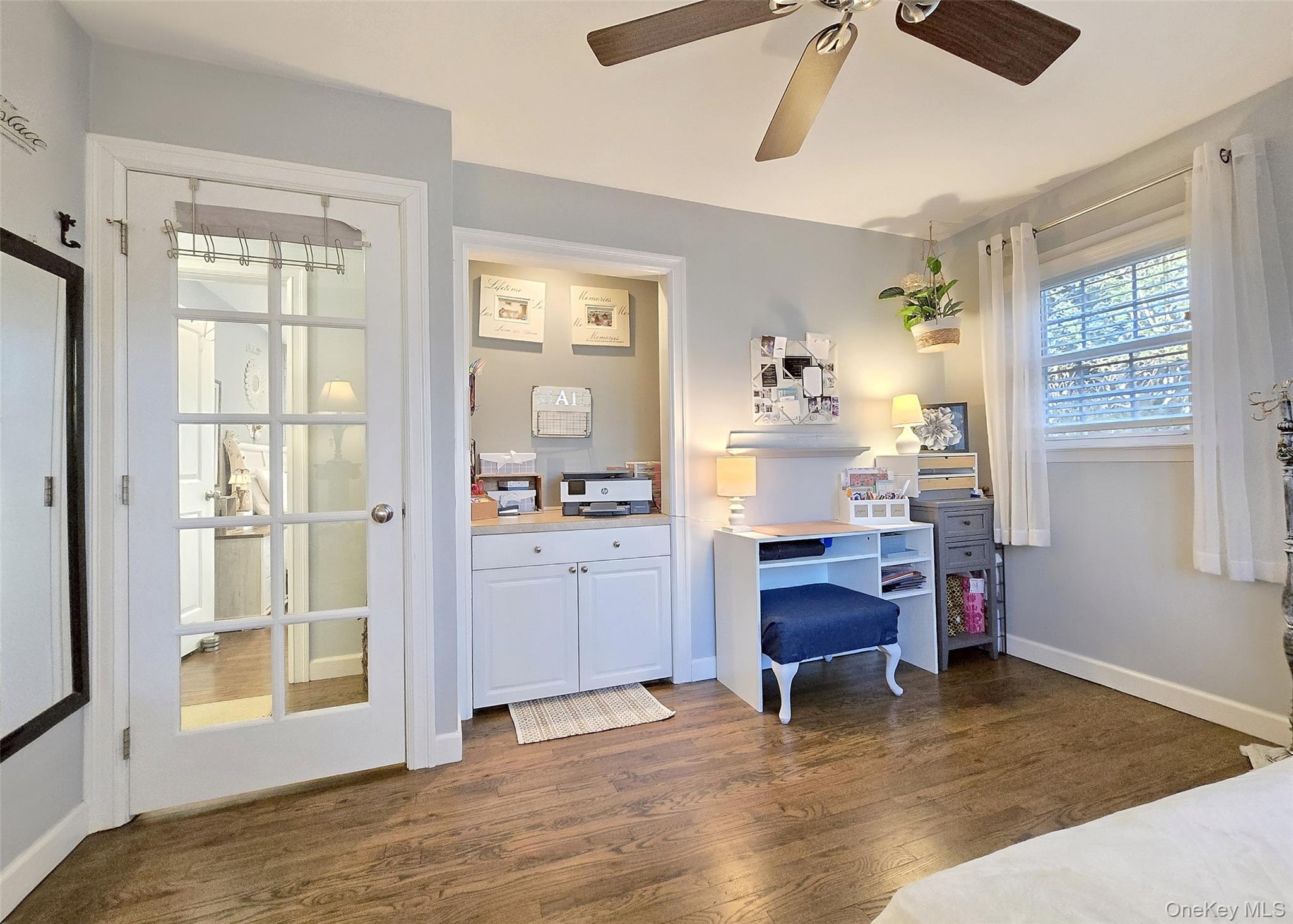 94 Clarendon Road Ronkonkoma, NY 11779 - Photo 19 of 31 a workspace room with a window and furniture