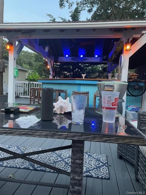 94 Clarendon Road Ronkonkoma, NY 11779 - Photo 27 of 31 a view of dinning table and chairs in the patio