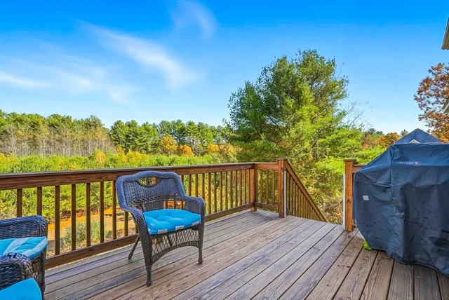 a view of a two chairs on the roof deck