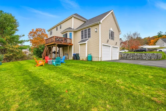 a front view of house with garden