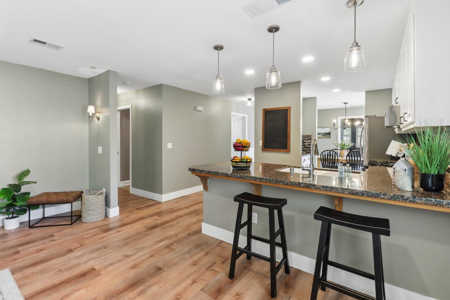 567 I Street Lincoln, CA 95648 - Photo 12 of 53 a kitchen with a table and chairs in it