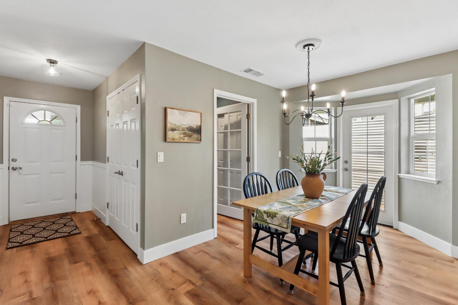 567 I Street Lincoln, CA 95648 - Photo 18 of 53 a view of a dining room with furniture window and wooden floor
