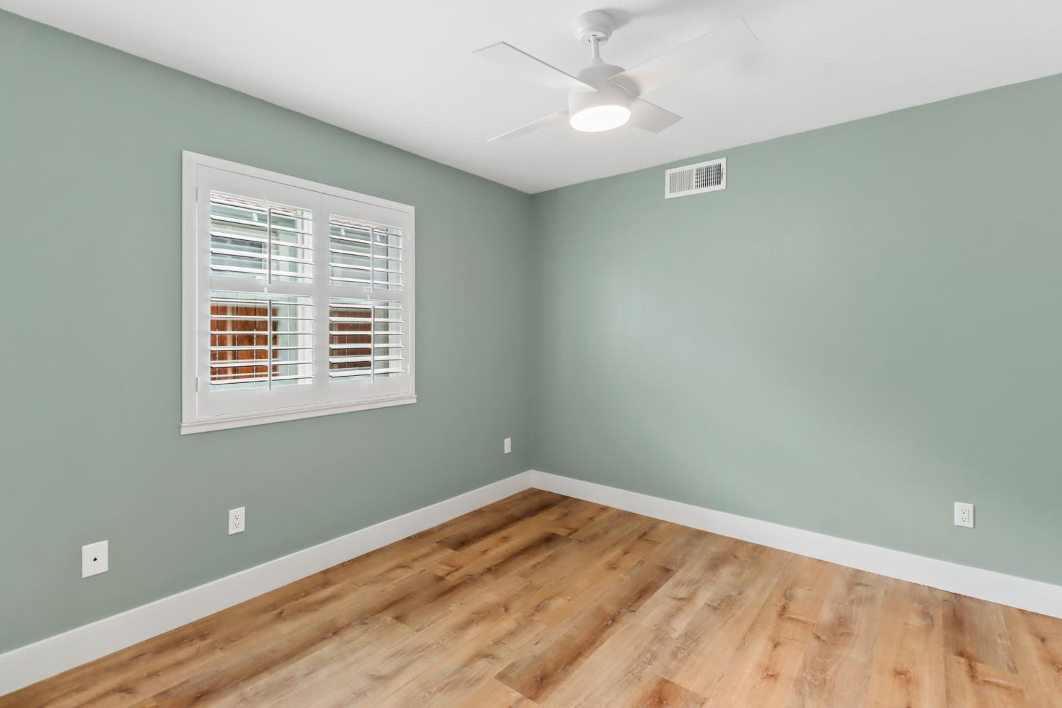 567 I Street Lincoln, CA 95648 - Photo 28 of 53 wooden floor in an empty room with a window